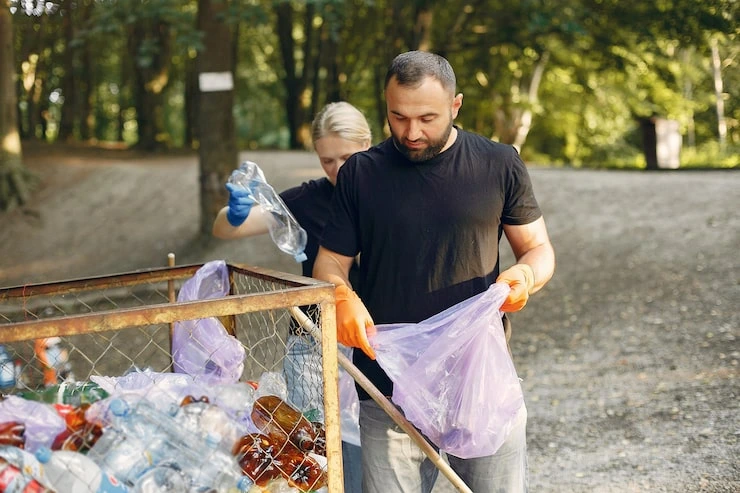 Homeowner organizing boxes as one of the Cheapest Ways to Get Rid of Junk
