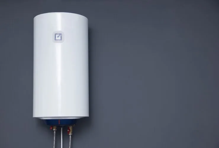 Step-by-step guide on how to dispose of an old water heater safely, including draining, disconnecting, and preparing for recycling