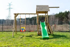 How to get rid of old swing set by safely disassembling it in a backyard
