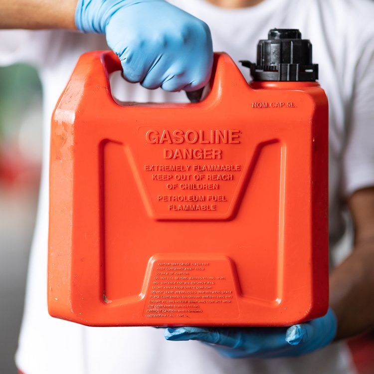 Proper disposal of old gasoline at a household hazardous waste facility