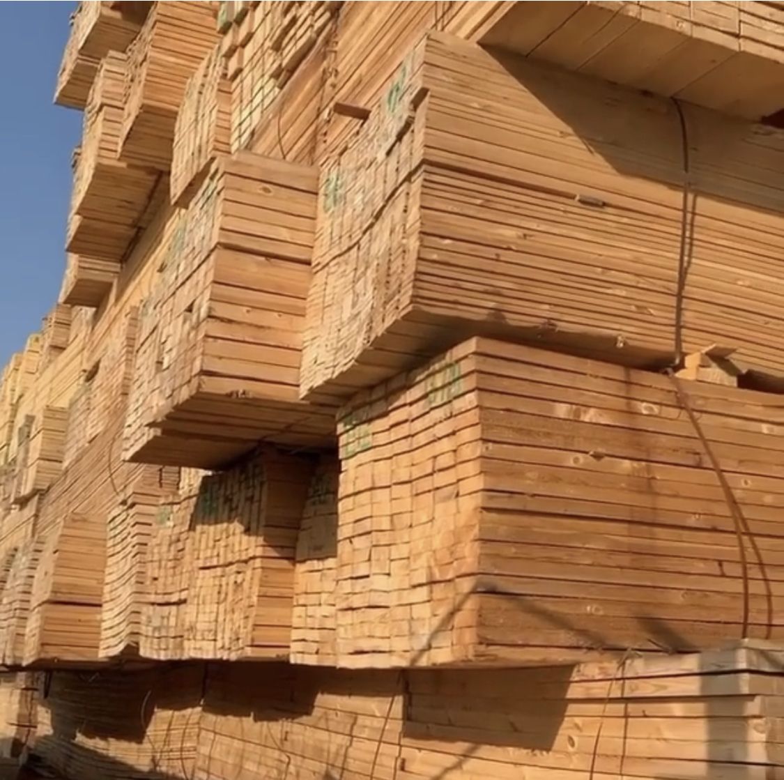 where to dispose of pressure treated wood -safely Pile of pressure treated wood ready for disposal