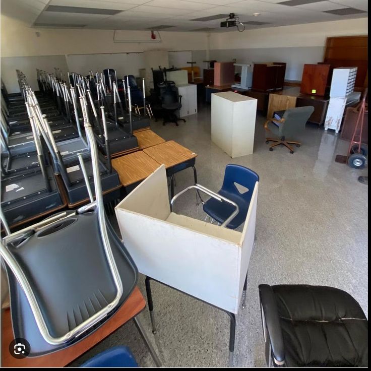 Commercial junk removal team loading office furniture is ready to pickup.