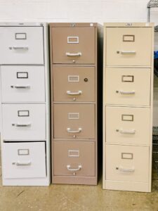 Old metal filing cabinet being recycled at a scrap metal recycling facility for eco-friendly filing cabinet disposal