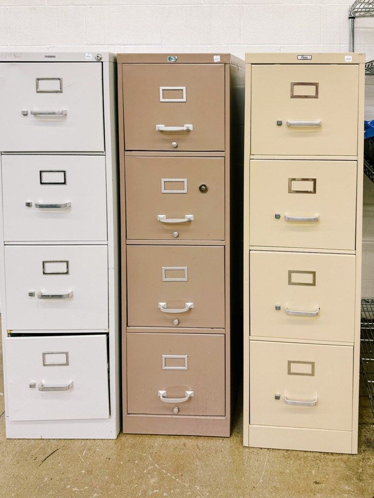 Old metal filing cabinet being recycled at a scrap metal recycling facility for eco-friendly filing cabinet disposal